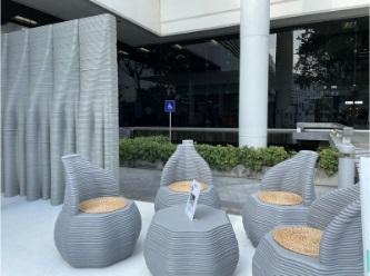 3D-printed furniture (chairs and coffee table)