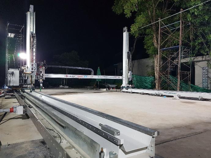 VSF Relocatable printer used in manufacturing of buildings in Thailand by SCG for manufacture of buildings onsite with curved and patterned surfaces.